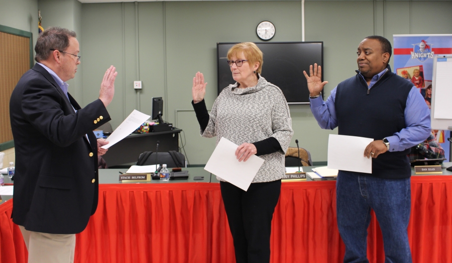 Board members being sworn in