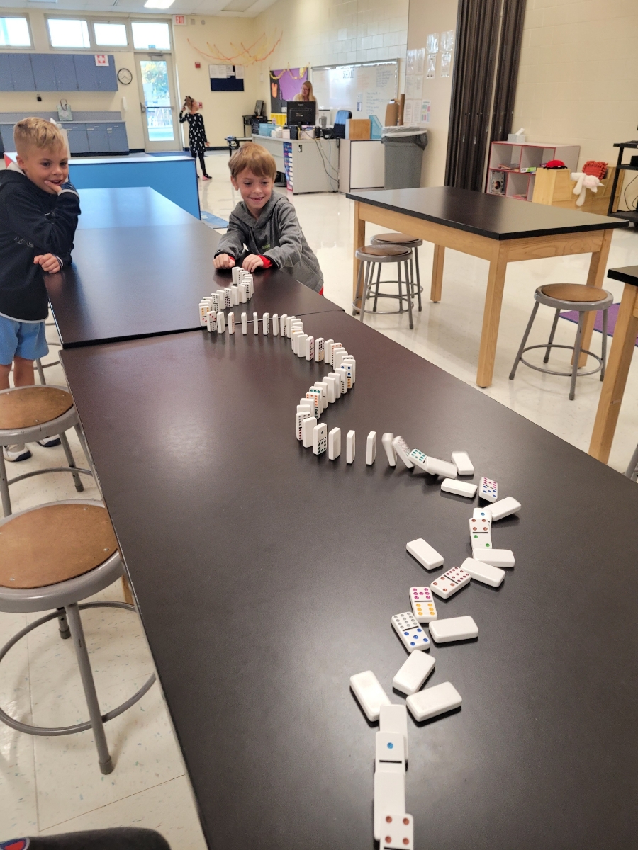 kids playing with dominos 