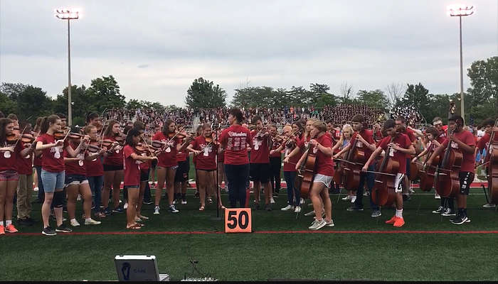 Orchestra performing at Kings Football Game